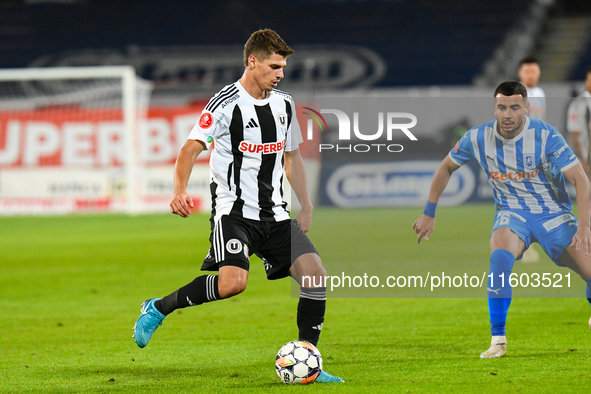 Gabriel Bogdan Simion participates in the match between Universitatea Cluj and Universitatea Craiova at Cluj Arena Stadium in Cluj, Romania,...