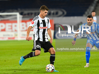 Gabriel Bogdan Simion participates in the match between Universitatea Cluj and Universitatea Craiova at Cluj Arena Stadium in Cluj, Romania,...