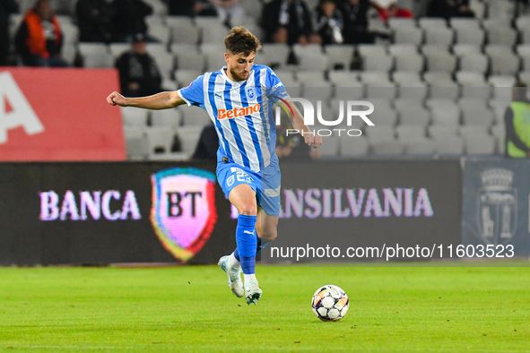 Cristian Mihai Capatina is in action during the match between Universitatea Cluj and Universitatea Craiova at Cluj Arena Stadium in Cluj, Ro...