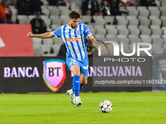 Cristian Mihai Capatina is in action during the match between Universitatea Cluj and Universitatea Craiova at Cluj Arena Stadium in Cluj, Ro...