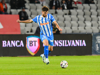 Cristian Mihai Capatina is in action during the match between Universitatea Cluj and Universitatea Craiova at Cluj Arena Stadium in Cluj, Ro...