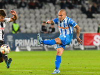 Ionut Alexandru Mitrita and Gabriel Bogdan Simion are in action during the match between Universitatea Cluj and Universitatea Craiova at Clu...