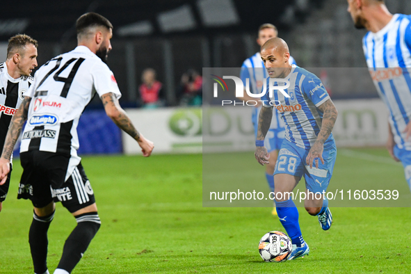 Ionut Alexandru Mitrita is in action during the match between Universitatea Cluj and Universitatea Craiova at Cluj Arena Stadium in Cluj, Ro...