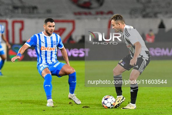 Robert Mihai Silaghi is in action during the match between Universitatea Cluj and Universitatea Craiova at Cluj Arena Stadium in Cluj, Roman...