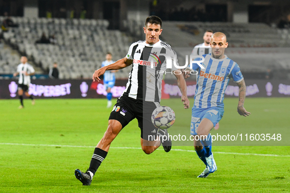 Lucas Gabriel Masoero and Ionut Alexandru Mitrita are in action during the match between Universitatea Cluj and Universitatea Craiova at Clu...