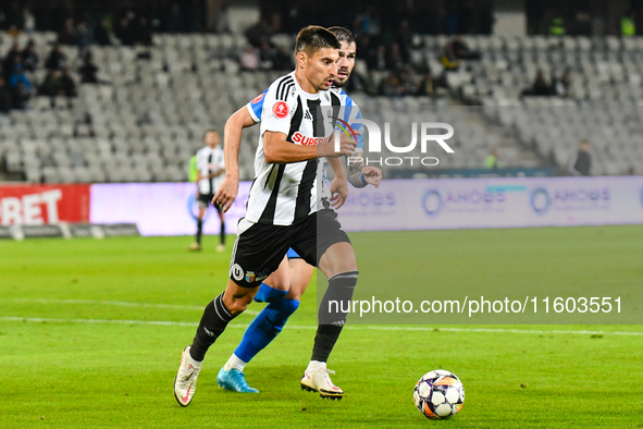 Lucian Iulian Cristea and Elvir Koljic are in action during the match between Universitatea Cluj and Universitatea Craiova at Cluj Arena Sta...