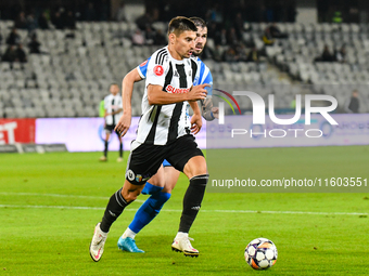 Lucian Iulian Cristea and Elvir Koljic are in action during the match between Universitatea Cluj and Universitatea Craiova at Cluj Arena Sta...