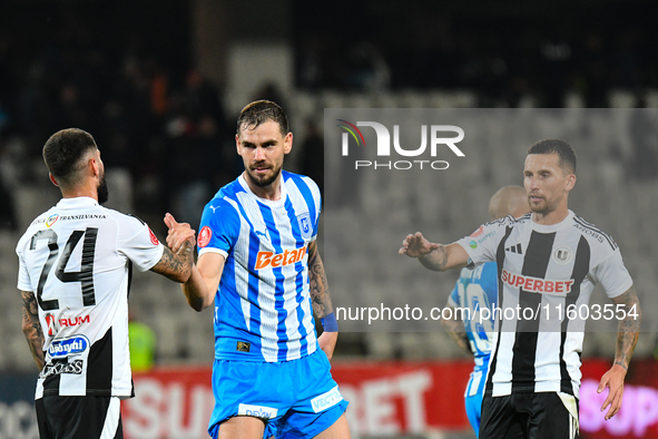 Elvir Koljic and Ovidiu Alexandru Bic participate in the match between Universitatea Cluj and Universitatea Craiova at Cluj Arena Stadium in...