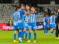 Nicusor Silviu Bancu, Juraj Badelj, and Elvir Koljic participate in the match between Universitatea Cluj and Universitatea Craiova in Cluj,...