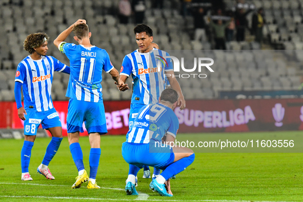 Nicusor Silviu Bancu, Elvir Koljic, Denil Omar Maldonado Munguia, and Takuto Oshima participate in the match between Universitatea Cluj and...