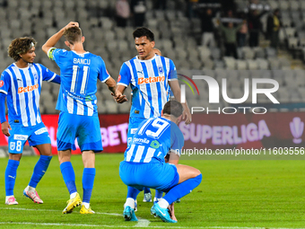 Nicusor Silviu Bancu, Elvir Koljic, Denil Omar Maldonado Munguia, and Takuto Oshima participate in the match between Universitatea Cluj and...