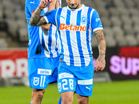 Nicusor Silviu Bancu and Ionut Alexandru Mitrita react during the match between Universitatea Cluj and Universitatea Craiova at Cluj Arena S...