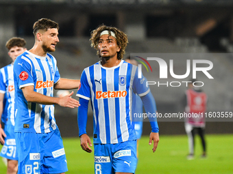 Cristian Mihai Capatina and Takuto Oshima participate in the match between Universitatea Cluj and Universitatea Craiova at Cluj Arena Stadiu...