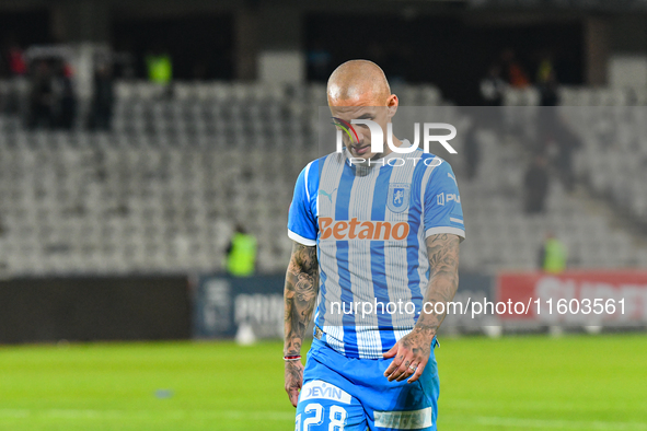 Ionut Alexandru Mitrita participates in the match between Universitatea Cluj and Universitatea Craiova at Cluj Arena Stadium in Cluj, Romani...