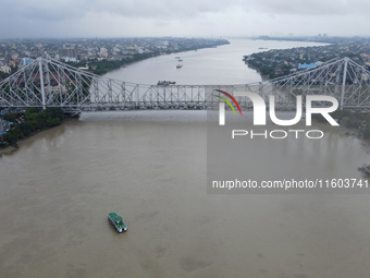 The aerial view of Howrah Bridge over the Hooghly River in Kolkata, India, on September 21, 2024. (