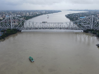 The aerial view of Howrah Bridge over the Hooghly River in Kolkata, India, on September 21, 2024. (