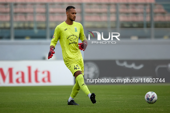 Henri Christoffer Mafoumbi, goalkeeper of Floriana, is in action during the Malta 360 Sports Premier League soccer match between Floriana an...