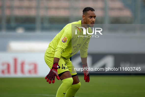 Henri Christoffer Mafoumbi, goalkeeper of Floriana, is in action during the Malta 360 Sports Premier League soccer match between Floriana an...