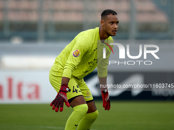 Henri Christoffer Mafoumbi, goalkeeper of Floriana, is in action during the Malta 360 Sports Premier League soccer match between Floriana an...