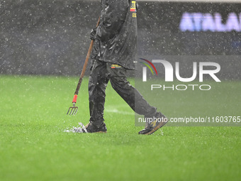 The rain does not allow the game to proceed during the Serie A football match between Atalanta BC and Calcio Como in Bergamo, Italy, on Sept...