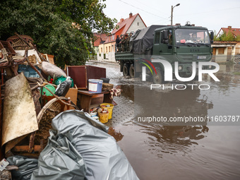 House items that were damaged by water are seen outside residential area after Nysa Klodzka river flooded town of Lewin Brzeski in southwest...