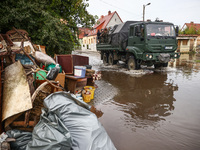 House items that were damaged by water are seen outside residential area after Nysa Klodzka river flooded town of Lewin Brzeski in southwest...