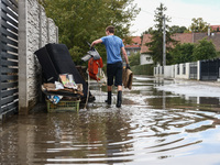 A man is cleaning a house which was damaged by water after Nysa Klodzka river flooded town of Lewin Brzeski in southwestern Poland. Septembe...