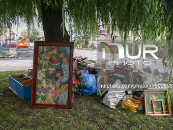 House items that were damaged by water are seen outside residential area after Nysa Klodzka river flooded town of Lewin Brzeski in southwest...