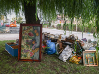 House items that were damaged by water are seen outside residential area after Nysa Klodzka river flooded town of Lewin Brzeski in southwest...