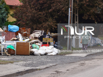 House items that were damaged by water are seen outside residential area after Nysa Klodzka river flooded town of Lewin Brzeski in southwest...