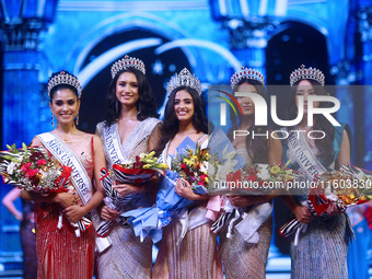 Miss Universe India 2024 Rhea Singha stands with the runner-up in Jaipur, Rajasthan, India, on September 22, 2024. (