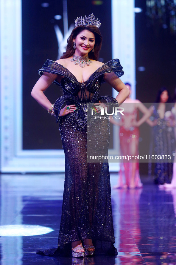 Miss Universe India 2015 and Bollywood actor Urvashi Rautela walks the ramp during the Miss Universe India 2024 grand finale in Jaipur, Raja...