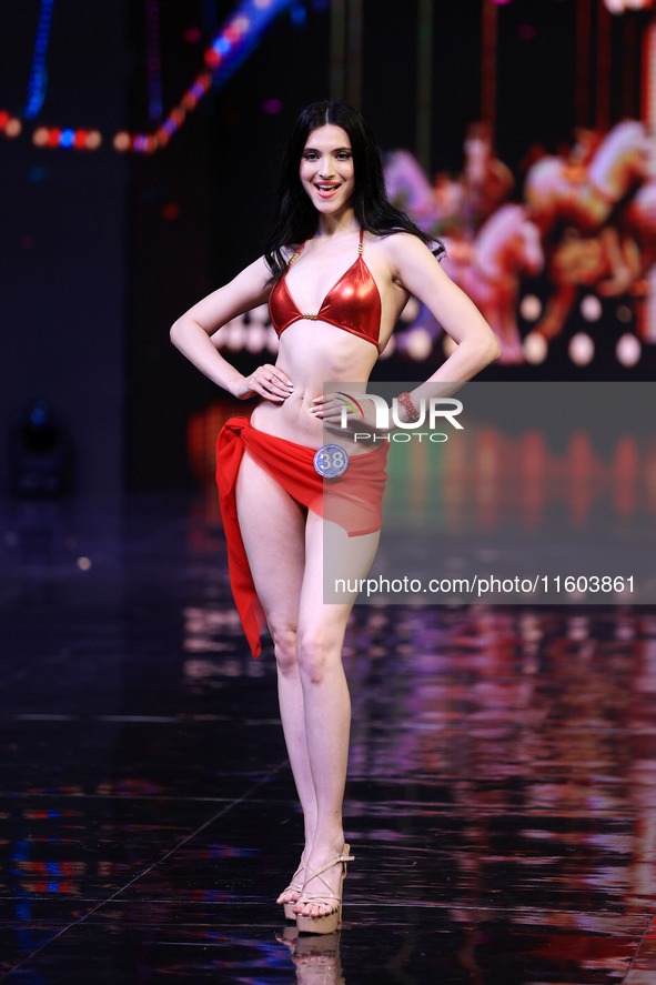 A contestant walks the ramp during the grand finale of Miss Universe India 2024 in Jaipur, Rajasthan, India, on September 22, 2024. 