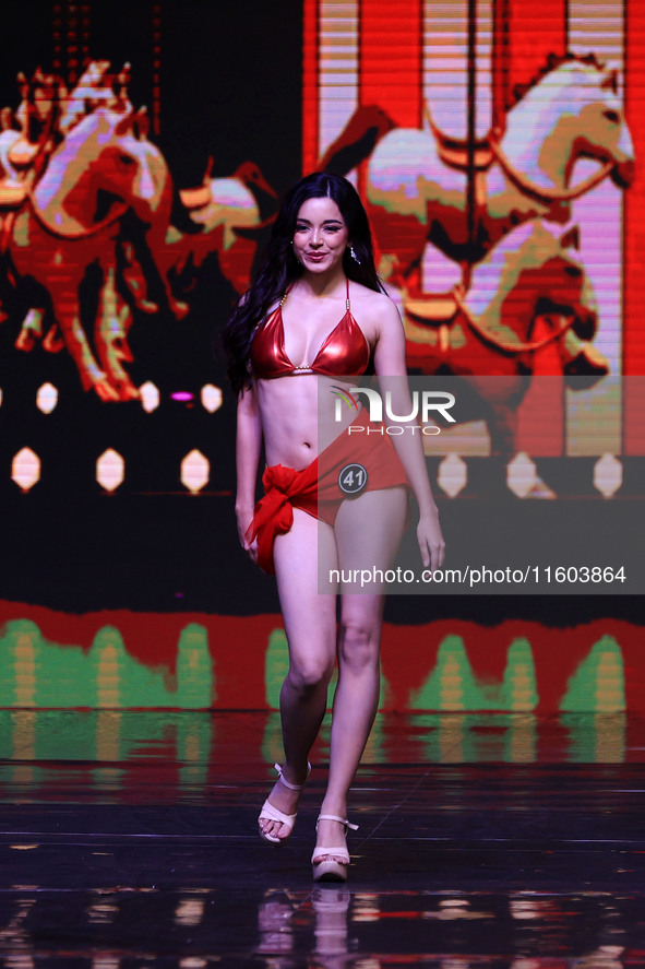 A contestant walks the ramp during the grand finale of Miss Universe India 2024 in Jaipur, Rajasthan, India, on September 22, 2024. 