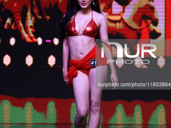 A contestant walks the ramp during the grand finale of Miss Universe India 2024 in Jaipur, Rajasthan, India, on September 22, 2024. (