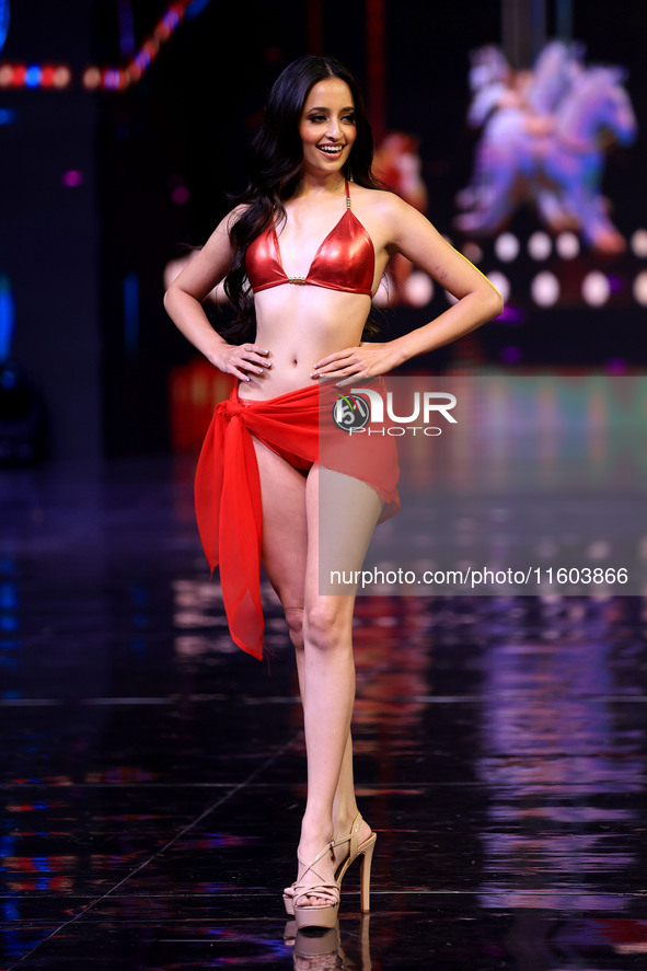 A contestant walks the ramp during the grand finale of Miss Universe India 2024 in Jaipur, Rajasthan, India, on September 22, 2024. 