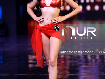 A contestant walks the ramp during the grand finale of Miss Universe India 2024 in Jaipur, Rajasthan, India, on September 22, 2024. (