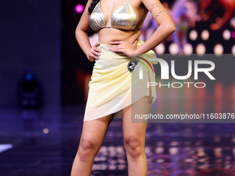 A contestant walks the ramp during the grand finale of Miss Universe India 2024 in Jaipur, Rajasthan, India, on September 22, 2024. (