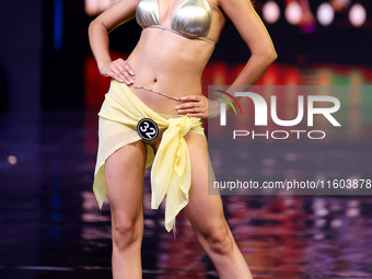 A contestant walks the ramp during the grand finale of Miss Universe India 2024 in Jaipur, Rajasthan, India, on September 22, 2024. (