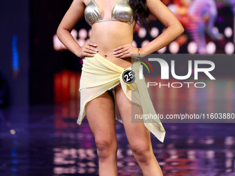 A contestant walks the ramp during the grand finale of Miss Universe India 2024 in Jaipur, Rajasthan, India, on September 22, 2024. (