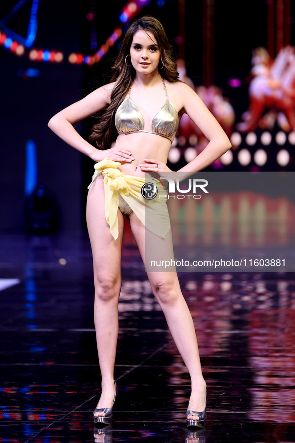 A contestant walks the ramp during the grand finale of Miss Universe India 2024 in Jaipur, Rajasthan, India, on September 22, 2024. 