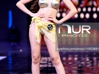 A contestant walks the ramp during the grand finale of Miss Universe India 2024 in Jaipur, Rajasthan, India, on September 22, 2024. (