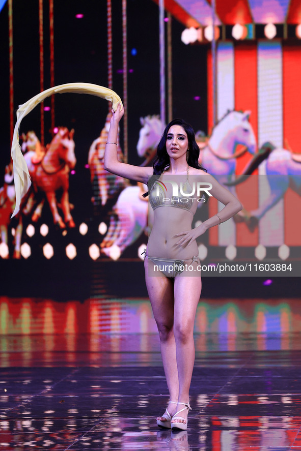 A contestant walks the ramp during the grand finale of Miss Universe India 2024 in Jaipur, Rajasthan, India, on September 22, 2024. 