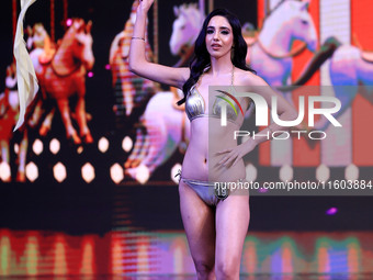 A contestant walks the ramp during the grand finale of Miss Universe India 2024 in Jaipur, Rajasthan, India, on September 22, 2024. (