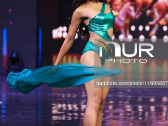 A contestant walks the ramp during the grand finale of Miss Universe India 2024 in Jaipur, Rajasthan, India, on September 22, 2024. (