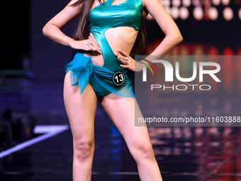 A contestant walks the ramp during the grand finale of Miss Universe India 2024 in Jaipur, Rajasthan, India, on September 22, 2024. (