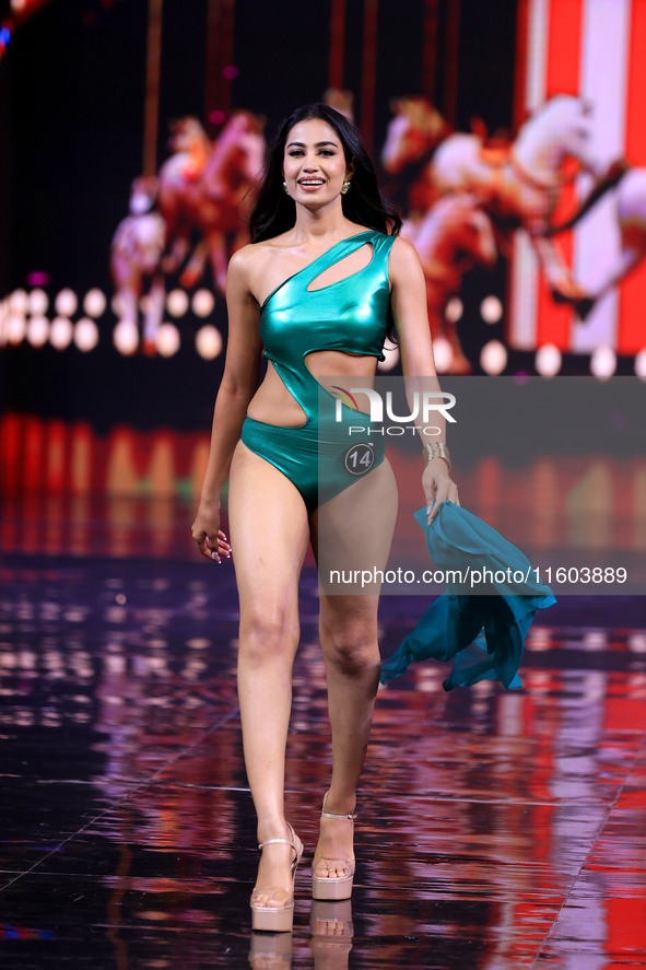 A contestant walks the ramp during the grand finale of Miss Universe India 2024 in Jaipur, Rajasthan, India, on September 22, 2024. 