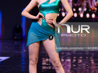 A contestant walks the ramp during the grand finale of Miss Universe India 2024 in Jaipur, Rajasthan, India, on September 22, 2024. (