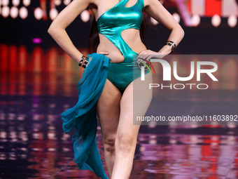 A contestant walks the ramp during the grand finale of Miss Universe India 2024 in Jaipur, Rajasthan, India, on September 22, 2024. (