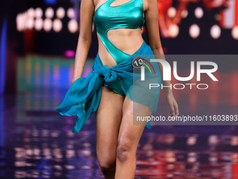 A contestant walks the ramp during the grand finale of Miss Universe India 2024 in Jaipur, Rajasthan, India, on September 22, 2024. (